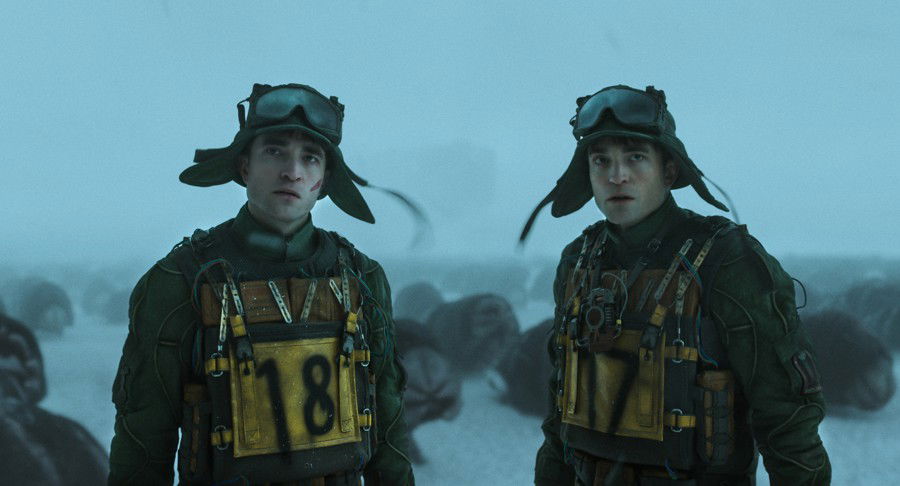 Robert Pattinson as Mickey 17 and 18
