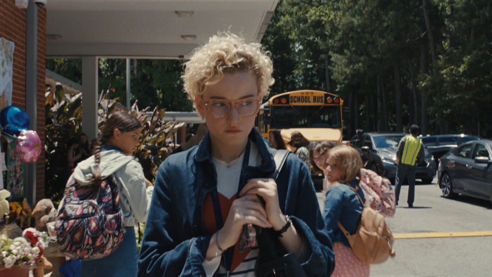 Julia Garner as Justine