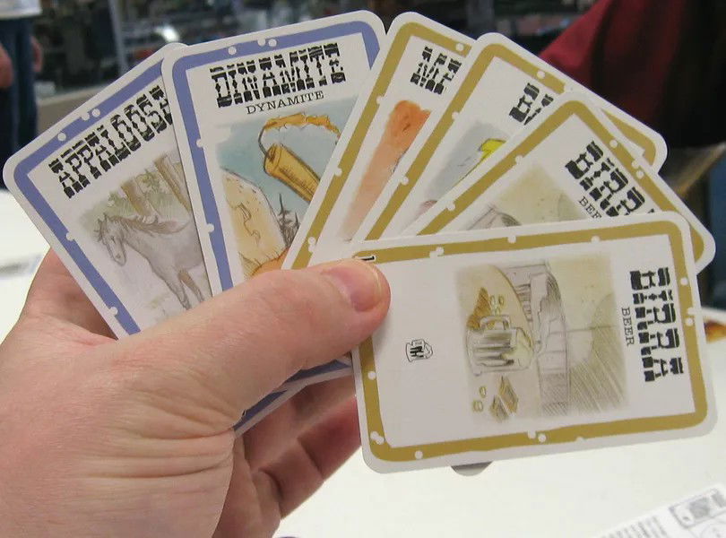 Blue-bordered cards and brown-bordered cards.