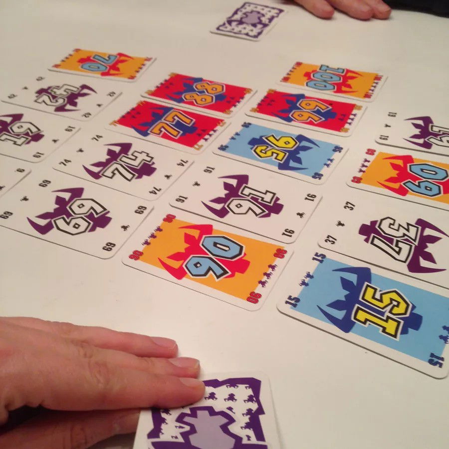 Players with their unrevealed cards for the turn
