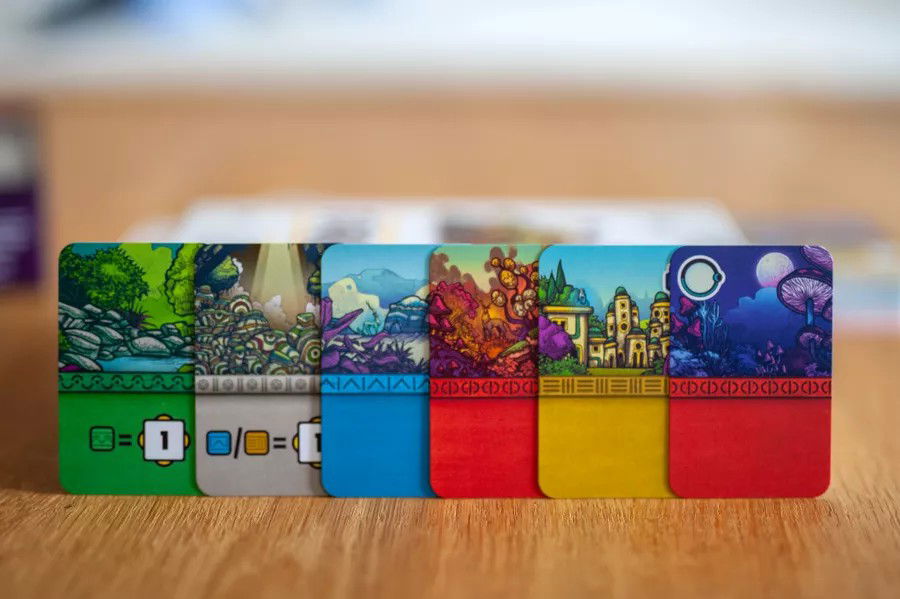 Sanctuary cards featuring different patterns for each color in the game.