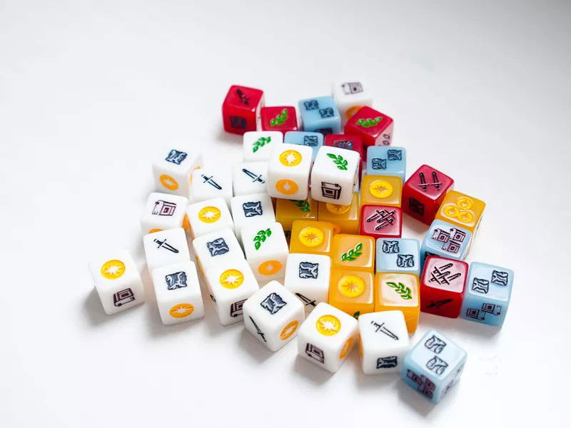 Dice depicting the Resources in the Game